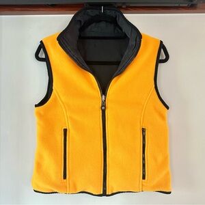 Reversible FU DA Sport vest with yellow fleece side & silk black reverse side